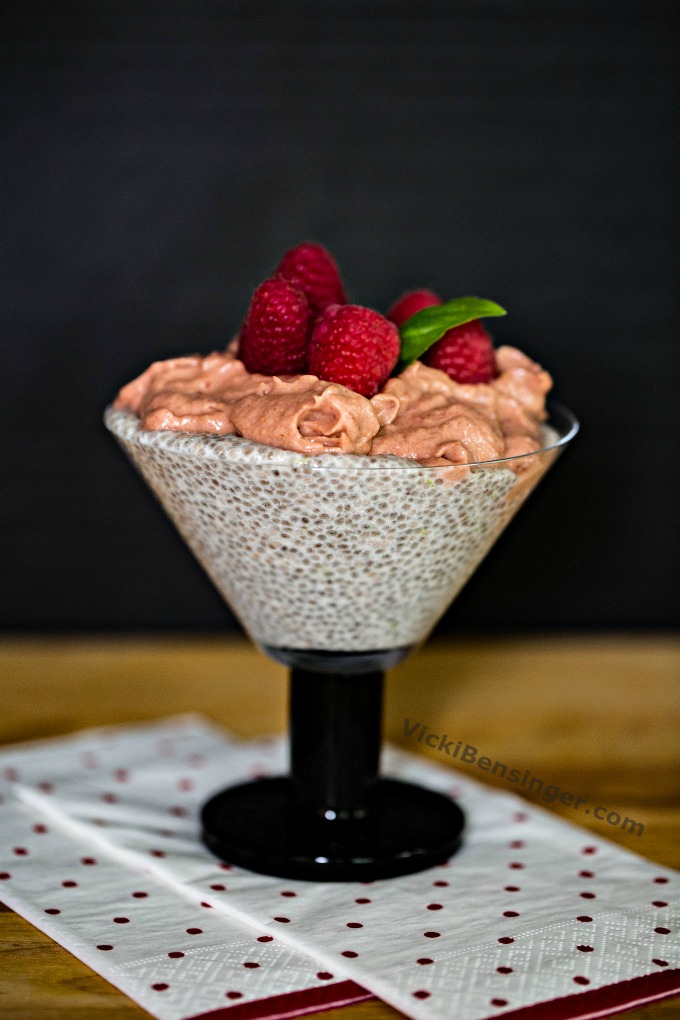 Raspberry Mousse & Chia Parfait topped with fresh Raspberries and sprig of basil