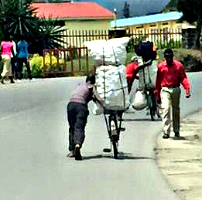 Barefoot Walker transporting goods in Rwanda