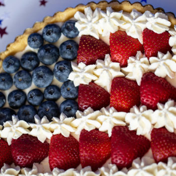 No-Bake Berry Tart with Strawberries, Blueberries, whipped Cream and a Lemon Oreo Crust