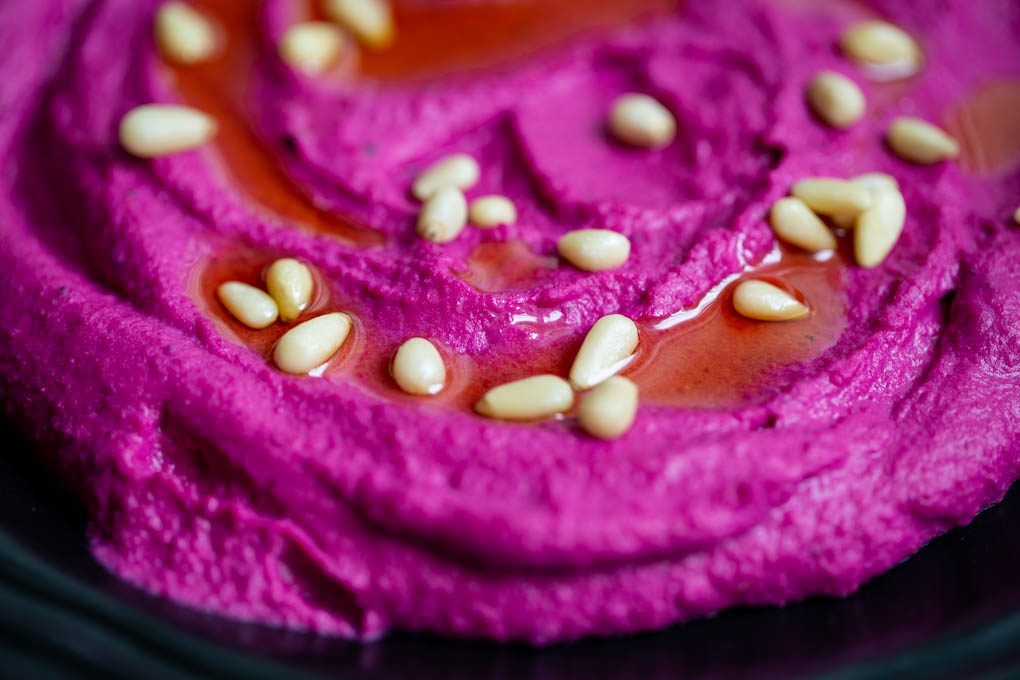 Roasted Beet Hummus with a drizzle of Olive Oil & Pine Nuts
