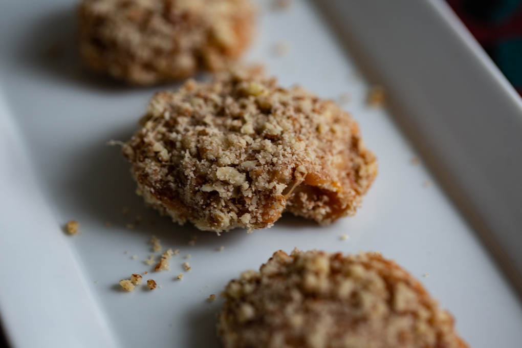 Apricot Delight is a dried apricot coated dipped in caramel and rolled in chopped pecans