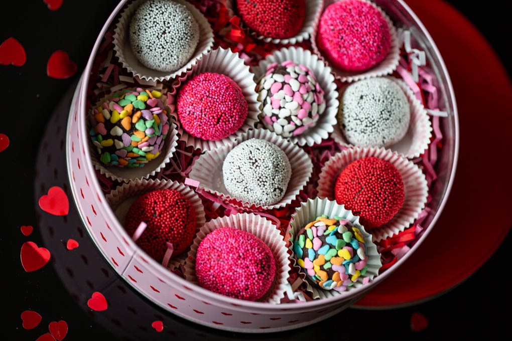 Valentine's Day Truffles with pink, red, white and heart sprinkles