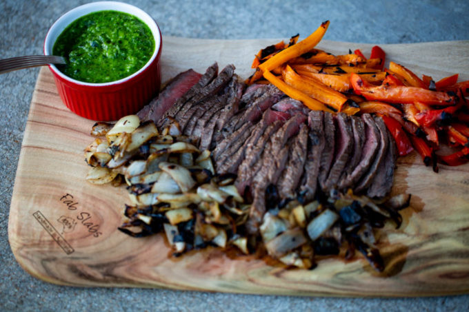 Grilled Lime Marinated Boneless Sirloin with Peppers, Onions & Chimichurri
