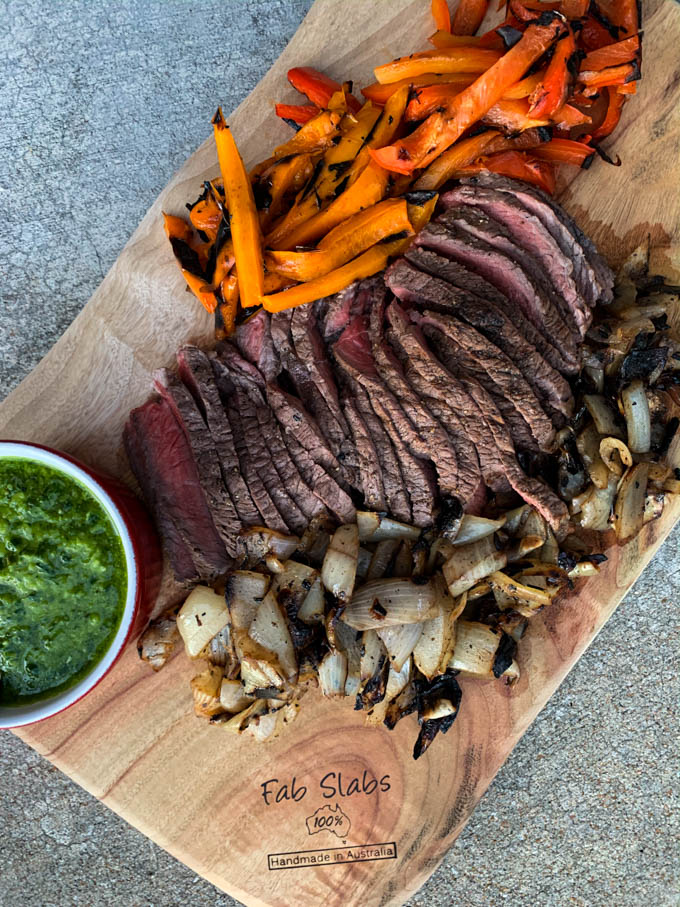 Grilled Lime Marinated Boneless Sirloin with Peppers, Onions & Chimichurri