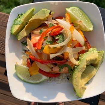 Salmon Bowl with cauliflower rice, roasted peppers & onions, and avocado